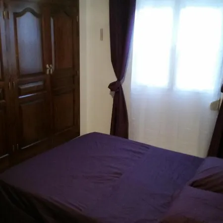 Elvira Villa *